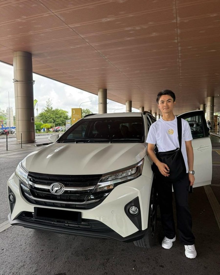 Car&Go customer collecting a Perodua rental car at Kuching International Airport